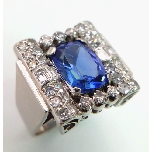 178 - A Platinum Art Deco Style Vintage Diamond and Tanzanite Ring. 5ct AAA rated tanzanite with a baguett... 