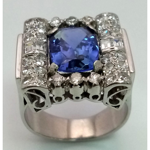 178 - A Platinum Art Deco Style Vintage Diamond and Tanzanite Ring. 5ct AAA rated tanzanite with a baguett... 