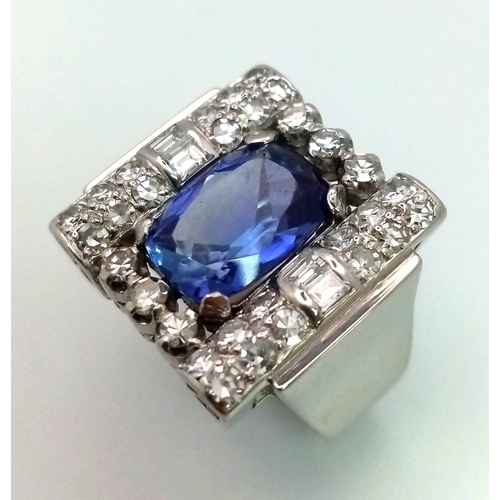 178 - A Platinum Art Deco Style Vintage Diamond and Tanzanite Ring. 5ct AAA rated tanzanite with a baguett... 