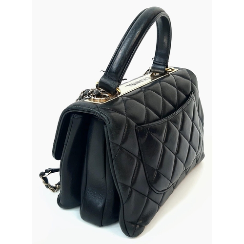 263 - A Stylish Chanel Top-Plate Hand/Shoulder Flap Bag. Quilted soft black leather. Gold tone hardware wi... 