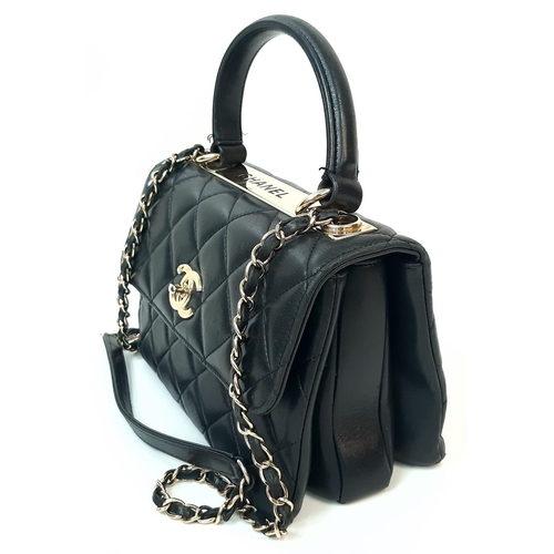 263 - A Stylish Chanel Top-Plate Hand/Shoulder Flap Bag. Quilted soft black leather. Gold tone hardware wi... 