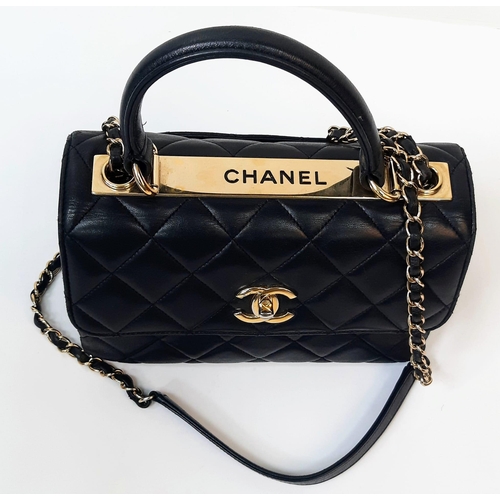 263 - A Stylish Chanel Top-Plate Hand/Shoulder Flap Bag. Quilted soft black leather. Gold tone hardware wi... 