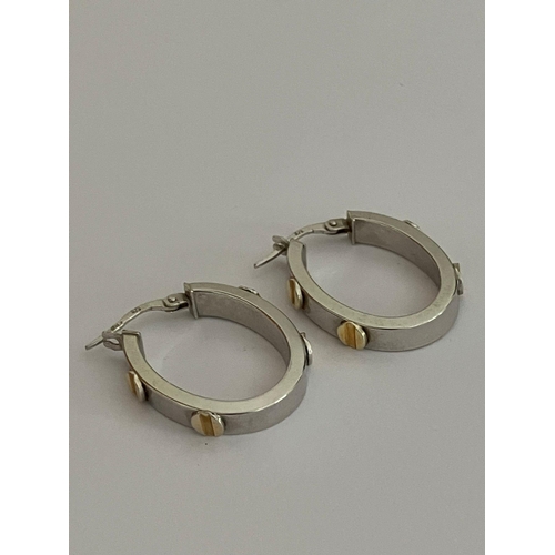 104 - 9 carat WHITE and YELLOW GOLD EARRINGS in GUCCI SCREW STYLE.Having full UK hallmark. 2.67 grams.