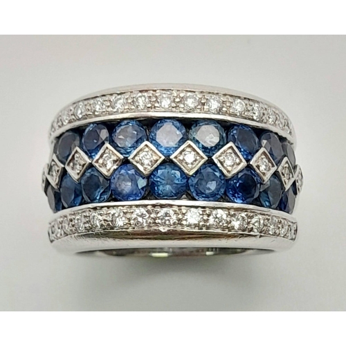 12 - A 18K WHITE GOLD 3 ROWS OF DIAMOND & 2 ROWS OF SAPPHIRE ALTERNATING RING. TOTAL WEIGHT  20.25G. SIZE... 