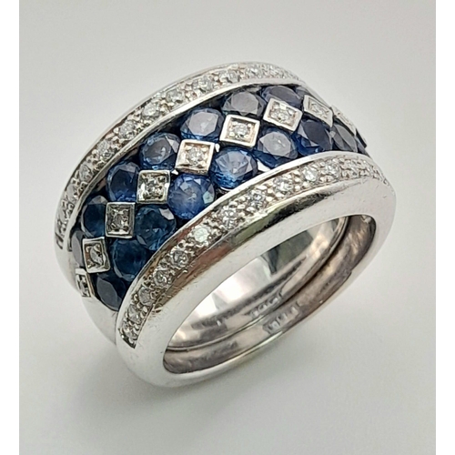 12 - A 18K WHITE GOLD 3 ROWS OF DIAMOND & 2 ROWS OF SAPPHIRE ALTERNATING RING. TOTAL WEIGHT  20.25G. SIZE... 