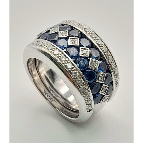 12 - A 18K WHITE GOLD 3 ROWS OF DIAMOND & 2 ROWS OF SAPPHIRE ALTERNATING RING. TOTAL WEIGHT  20.25G. SIZE... 