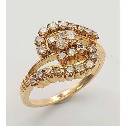 144 - A 18K ROSE GOLD 0.60CT DIAMOND CLUSTER CROSS OVER RING. TOTAL WEIGHT 4.4G. SIZE O.