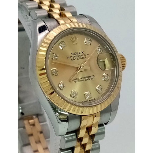 165 - AN UPDATED STYLE LADIES ROLEX OYSTER PERPETUAL DATEJUST BI-METAL WATCH WITH DIAMOND NUMERALS .  26mm