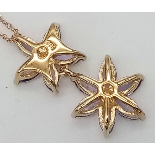 169 - An Unworn 9 Carat Yellow Gold & Tanzanite Set Double Flower Design Pendant Necklace. 46cm Length... 