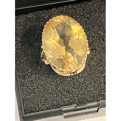 188 - 9 carat GOLD and CITRINE RING Having an enormous 7.5 carat CITRINE SOLITAIRE Set in a GOLD CROWN MOU... 