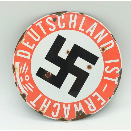 190 - A Vintage German Nazi Enamel Metal Sign ‘Deutschland 1st Erwacht’. 15cm Diameter. This appears to be... 