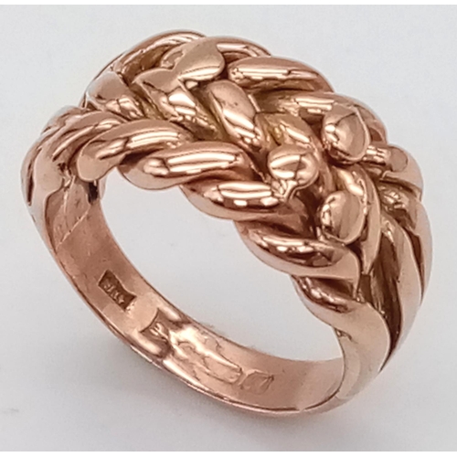 220 - A 9K ROSE GOLD KEEPER RING. TOTAL WEIGHT 7.8G. SIZE N/O.