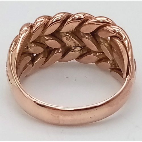 220 - A 9K ROSE GOLD KEEPER RING. TOTAL WEIGHT 7.8G. SIZE N/O.