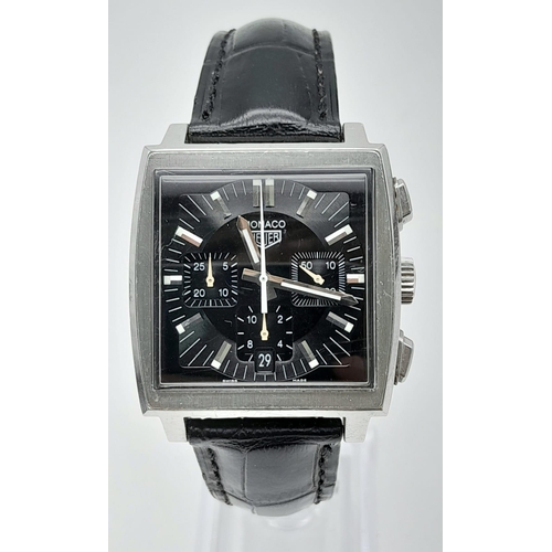 46 - A Tag Heuer Monaco Chronograph Quartz Gents Watch. Black leather strap. Stainless steel case - 38mm.... 