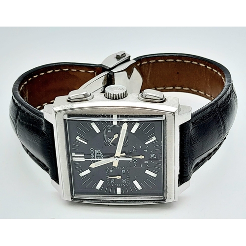 46 - A Tag Heuer Monaco Chronograph Quartz Gents Watch. Black leather strap. Stainless steel case - 38mm.... 