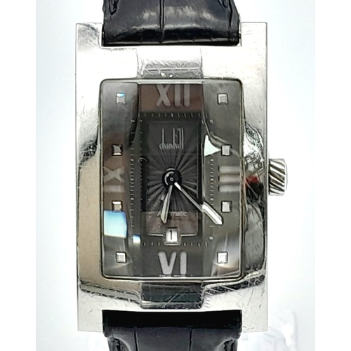 67 - A DUNHILL STAINLESS STEEL TANK STYLE WATCH WITH FACETED GLASS FACE ON A BLACK LEATHER STRAP .  25 X ... 