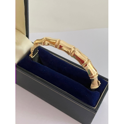 7 - Stunning 9 carat YELLOW GOLD BANGLE in Bamboo design. Gold safety chain attached. Full UK hallmark. ... 