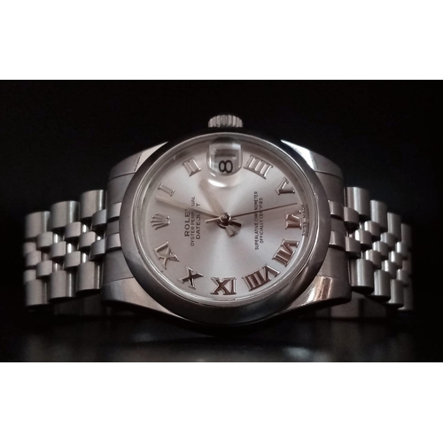 151 - A  ROLEX OYSTER PERPETUAL DATEJUST IN STAINLESS STEEL WITH SILVERTONE DIAL , ROMAN NUMERALS AND WITH... 