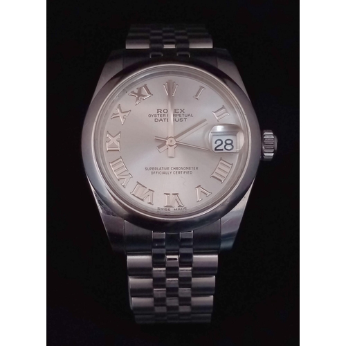 151 - A  ROLEX OYSTER PERPETUAL DATEJUST IN STAINLESS STEEL WITH SILVERTONE DIAL , ROMAN NUMERALS AND WITH... 