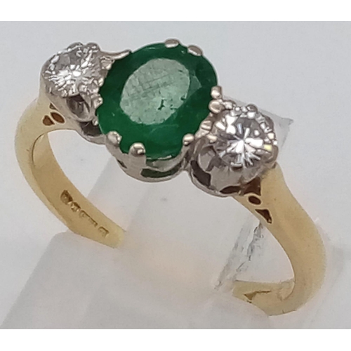 A 18K YELLOW GOLD 0.3CT DIAMOND u0026 0.75CT OVAL EMERALD RING. TOTAL WEIGHT  3.5G. SIZE L/M.