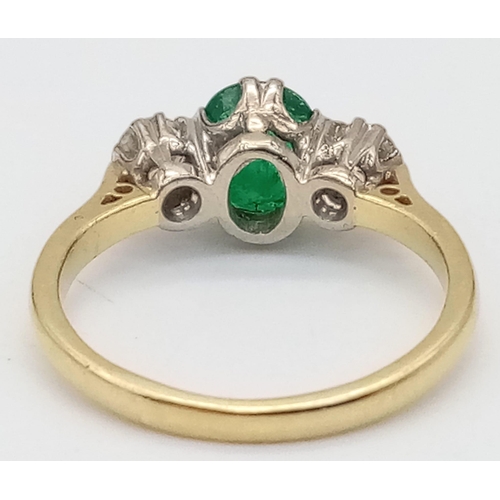 171 - A 18K YELLOW GOLD 0.3CT DIAMOND & 0.75CT OVAL EMERALD RING. TOTAL WEIGHT 3.5G. SIZE L/M.