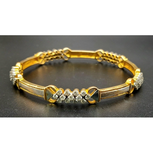 19 - A 18K YELLOW GOLD 2CT DIAMOND SET BANGLE. DIAMETER 6 CM. TOTAL WEIGHT 20.6G.