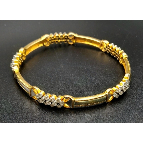 19 - A 18K YELLOW GOLD 2CT DIAMOND SET BANGLE. DIAMETER 6 CM. TOTAL WEIGHT 20.6G.