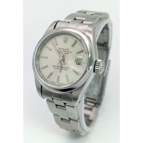 205 - A LADIES ROLEX OYSTER PERPETUAL DATEJUST IN STAINLESS STEEL WITH SILVERTONE DIAL AND IN AS NEW CONDI... 