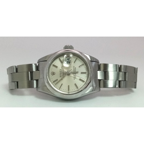 205 - A LADIES ROLEX OYSTER PERPETUAL DATEJUST IN STAINLESS STEEL WITH SILVERTONE DIAL AND IN AS NEW CONDI... 