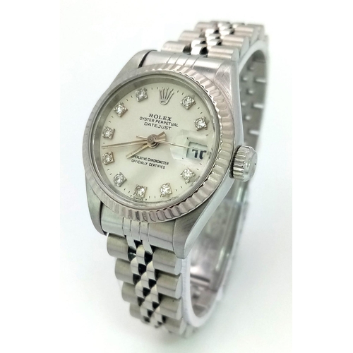 219 - A LADIES ROLEX OYSTER PERPETUAL DATEJUST IN STAINLESS STEEL WITH DIAMOND NUMERALS AND COMPLIMENTARY ... 