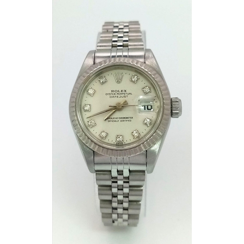 219 - A LADIES ROLEX OYSTER PERPETUAL DATEJUST IN STAINLESS STEEL WITH DIAMOND NUMERALS AND COMPLIMENTARY ... 