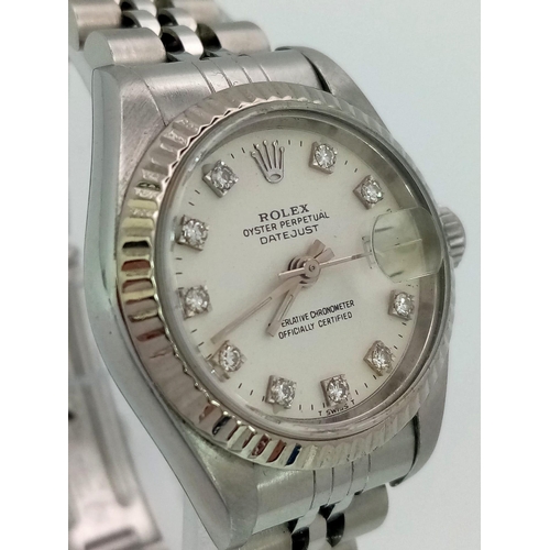 219 - A LADIES ROLEX OYSTER PERPETUAL DATEJUST IN STAINLESS STEEL WITH DIAMOND NUMERALS AND COMPLIMENTARY ... 