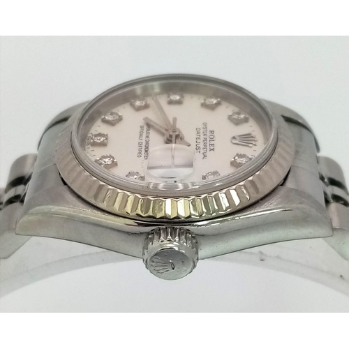 219 - A LADIES ROLEX OYSTER PERPETUAL DATEJUST IN STAINLESS STEEL WITH DIAMOND NUMERALS AND COMPLIMENTARY ... 