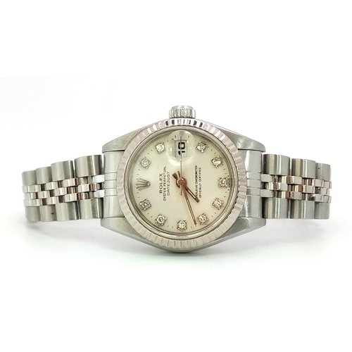 219 - A LADIES ROLEX OYSTER PERPETUAL DATEJUST IN STAINLESS STEEL WITH DIAMOND NUMERALS AND COMPLIMENTARY ... 