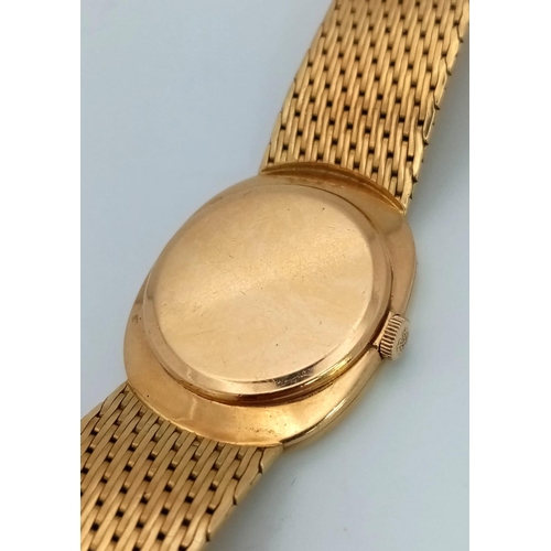 282 - A PATEK PHILIPPE 18K GOLD GENTS  GENEVE WRIST WATCH WITH SOLID 18K GOLD STRAP , STRIKING BLUE OVAL S... 