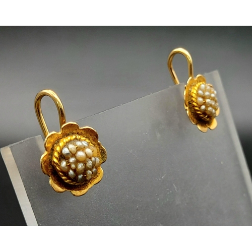 305 - A VINTAGE PAIR OF 18K YELLOW GOLD SEED PEARL IN FLOWER DESIGN EARRINGS. TOTAL WEIGHT 2.6G