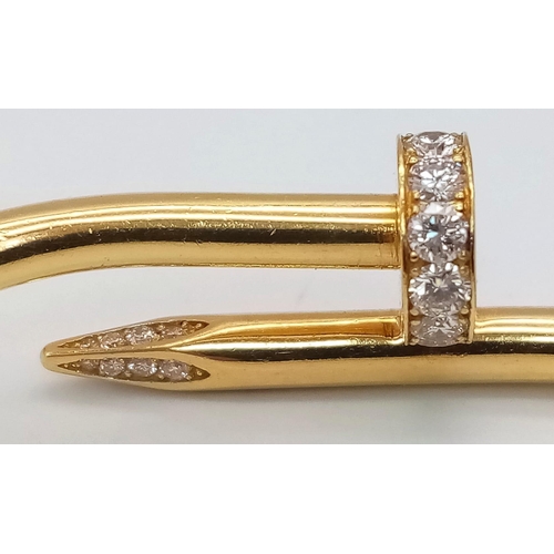 5 - A 18K YELLOW GOLD 0.45CT DIAMOND SET CARTIER STYLE NAIL BANGLE. TOTAL WEIGHT 34.34G. THE WIDEST INNE... 