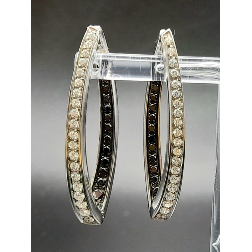 78 - A Pair of Designer Palmiero 18K White Gold, Black and White Diamond Elongated Hoop Earrings. 0.93ct ... 