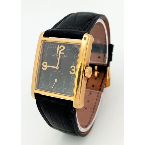 79 - A PATEK PHILIPPE VINTAGE 18K GOLD TANK STYLE WATCH WITH A SUBDIAL AND GEOMETRIC DESIGN ON THE FACE ,... 