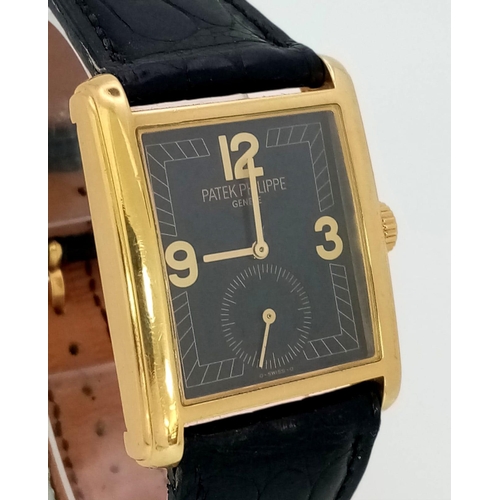 79 - A PATEK PHILIPPE VINTAGE 18K GOLD TANK STYLE WATCH WITH A SUBDIAL AND GEOMETRIC DESIGN ON THE FACE ,... 