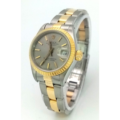 93 - A LADIES BI-METAL ROLEX OYSTER PERPETUAL DATEJUST WITH LATEST STYLE STRAP , SILVERTONE DIAL IN AS NE... 