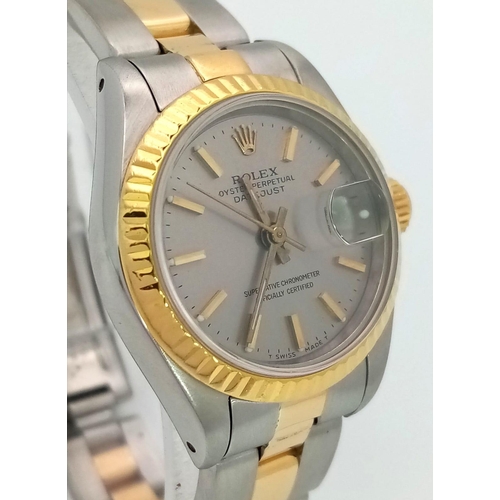 93 - A LADIES BI-METAL ROLEX OYSTER PERPETUAL DATEJUST WITH LATEST STYLE STRAP , SILVERTONE DIAL IN AS NE... 