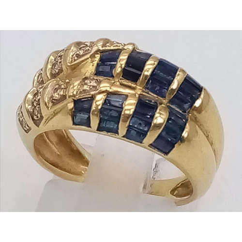 192 - A 18K YELLOW GOLD DIAMOND & SAPPHIRE RING. TOTAL WEIGHT 5.3G. SIZE L.