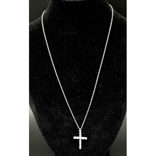 204 - An 18K White Gold and Diamond Cross Pendant on an 18K White Gold Necklace. 3cm - pendant with 12 rou... 