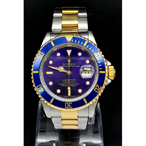 65 - A ROLEX SUBMARINER WATCH WITH STUNNING BLUE DIAL AND MATCHING BLUE BEZEL , BI-METAL STRAP . EVERY MA... 