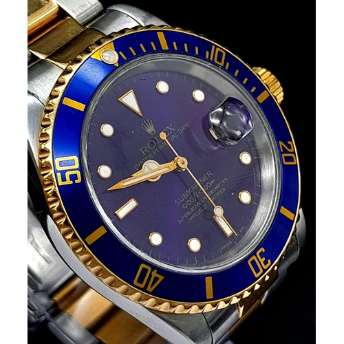 65 - A ROLEX SUBMARINER WATCH WITH STUNNING BLUE DIAL AND MATCHING BLUE BEZEL , BI-METAL STRAP . EVERY MA... 