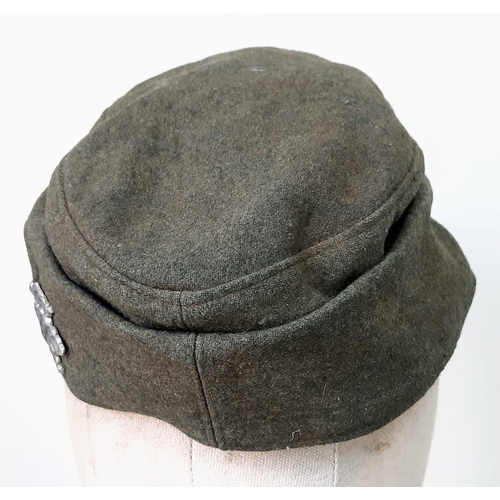 145 - WW2 German Heer (Army) M43 Cap with Jäger (light infantry mountain troops) Insignia.