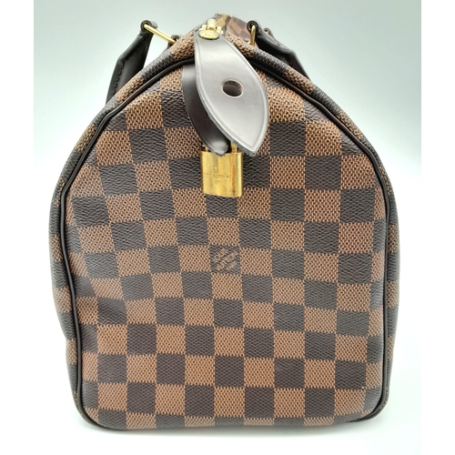 44 - A Louis Vuitton Speedy 30 ebony damier canvas Handbag. Accessories to include padlock and key. Come ... 