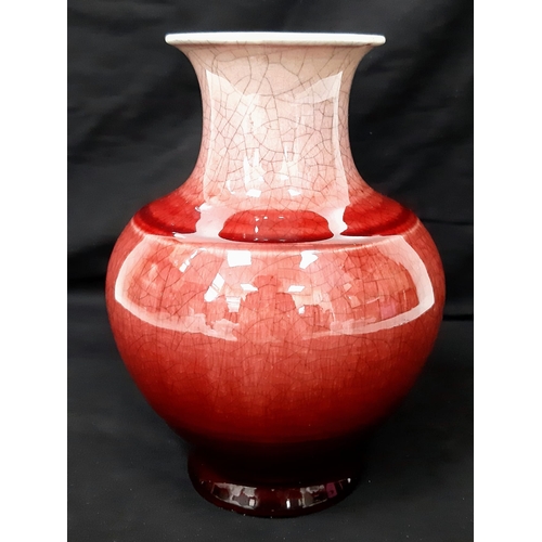 52 - An 18th Century Chinese Red Glaze Yu Hu Chun Porcelain Vase. Beautiful crackle effect throughout. 26... 