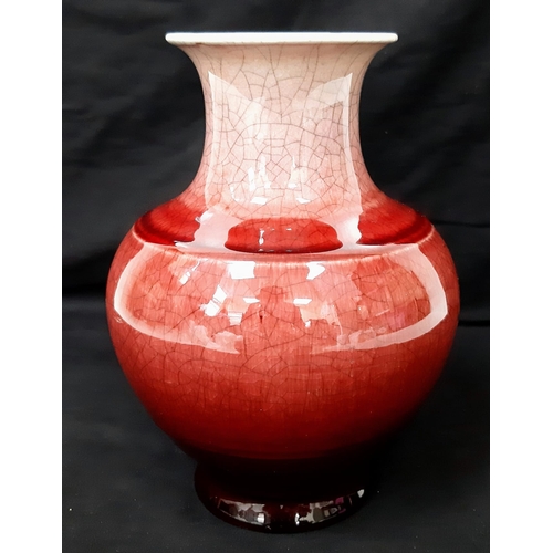 52 - An 18th Century Chinese Red Glaze Yu Hu Chun Porcelain Vase. Beautiful crackle effect throughout. 26... 